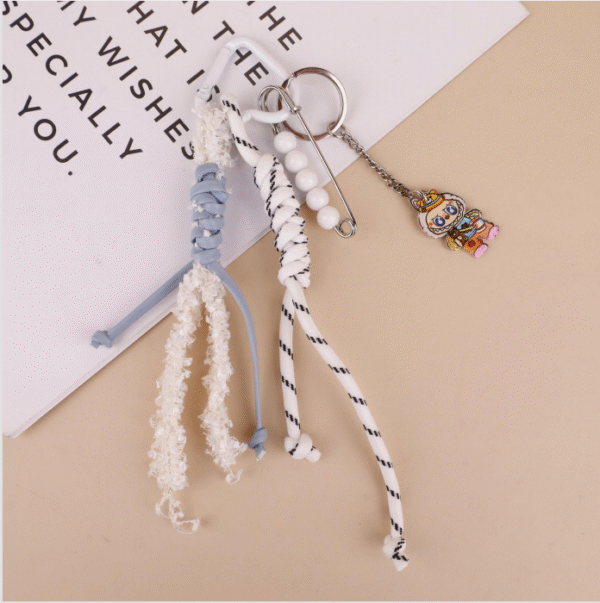 Labubu blue-green color woven ribbon pendant